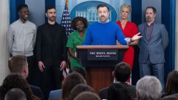 English actor Toheeb Jimoh, British actor Brett Goldstein, White House Press Secretary Karine Jean-Pierre, English actress Hannah Waddingham, and US actor Brendan Hunt look on as US actor Jason Sudeikis speaks during the daily briefing in the James S Brady Press Briefing Room of the White House in Washington, DC, on March 20, 2023.