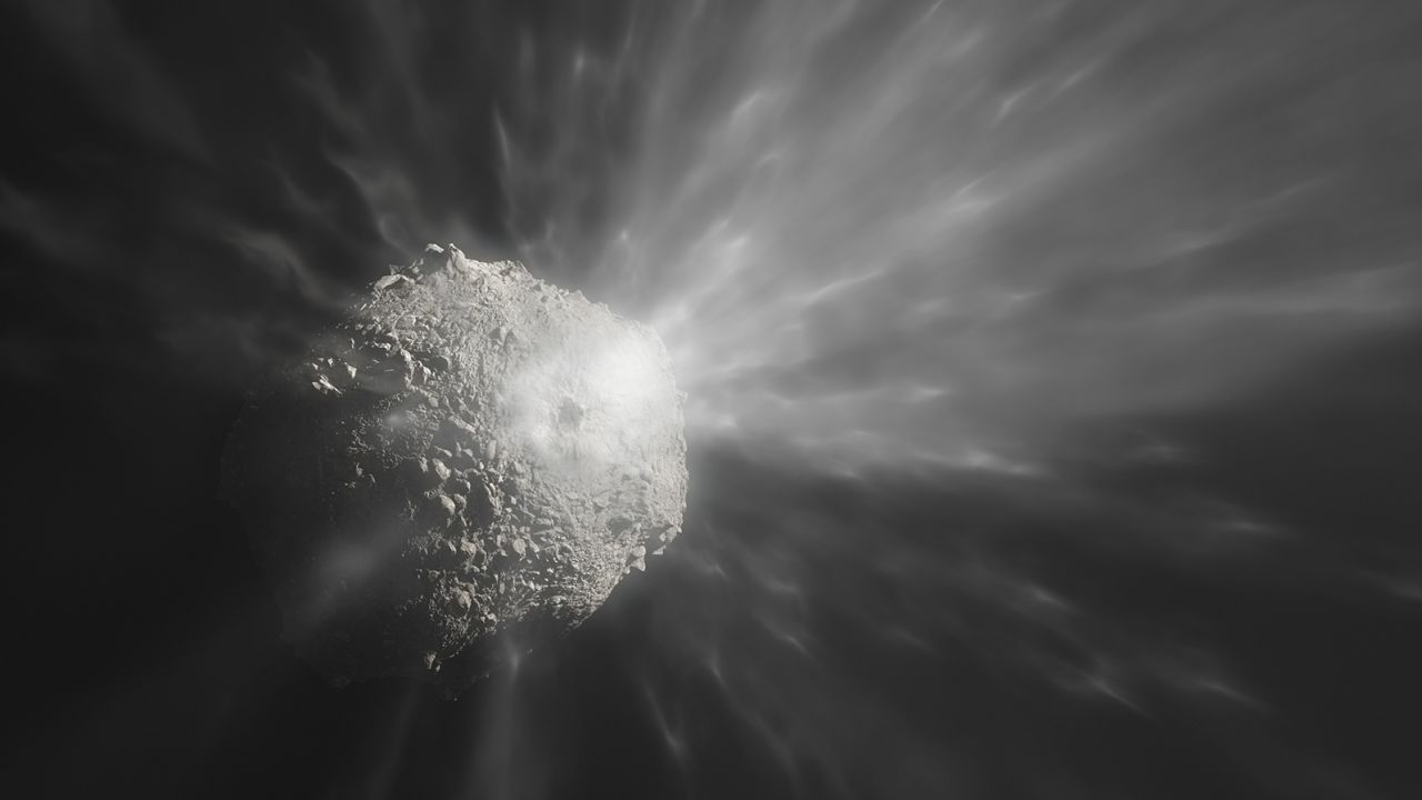 An artist's illustration depicts how the debris cloud likely looked as it was blasted off of the asteroid. 