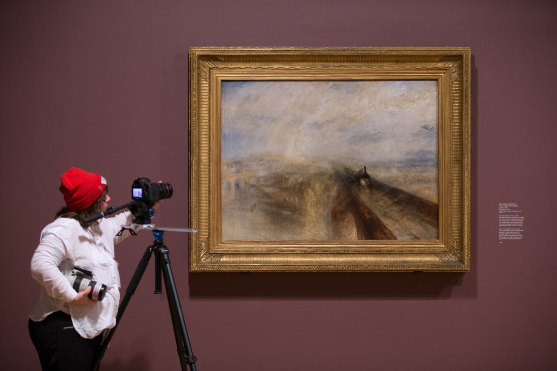 A painting by J.M.W. Turner titled "Rain, Steam and Speed — the Great Western Railway" in an exhibition at the Tate Britain gallery in 2014 in London, England. 