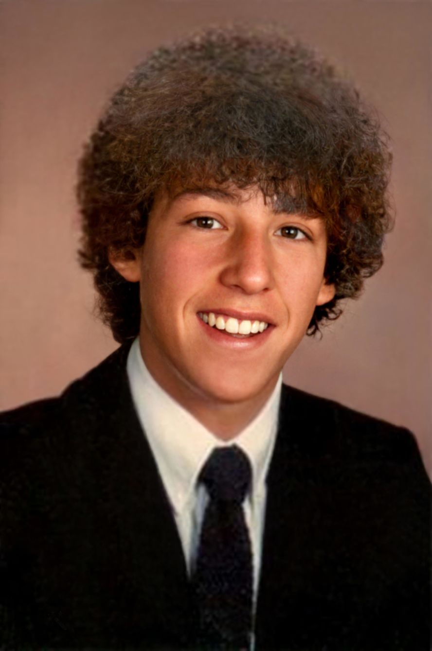 A 17-year-old Sandler in his high school yearbook picture. Sandler grew up in Manchester, New Hampshire, and graduated from New York University's Tisch School of the Arts in 1988.