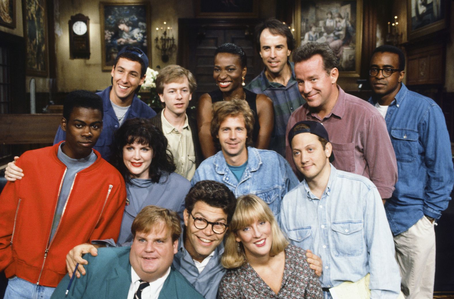 Sandler, top left, poses with other members of the "Saturday Night Live" cast in 1992. Before he joined the cast, Sandler was a writer for the show. With him in the top row, from left, are David Spade, Ellen Cleghorne, Kevin Nealon, Phil Hartman and Tim Meadows. In the second row are Chris Rock, Julia Sweeney, Dana Carvey and Rob Schneider. At the bottom are Chris Farley, Al Franken and Melanie Hutsell.