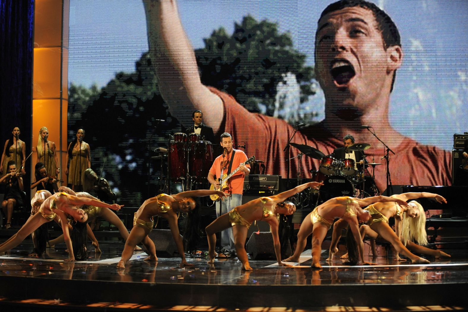 Sandler performs "Nobody Does It Better," the theme from the 1977 James Bond film "The Spy Who Loved Me," at the 2008 MTV Movie Awards. Sandler was being honored with the MTV Generation Award.