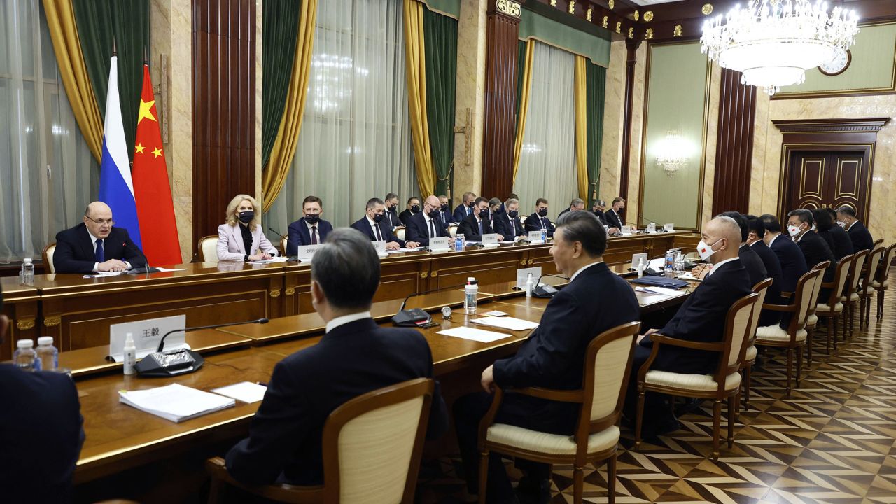 Russian Prime Minister Mikhail Mishustin meets with China's President Xi Jinping in Moscow on March 21, 2023.