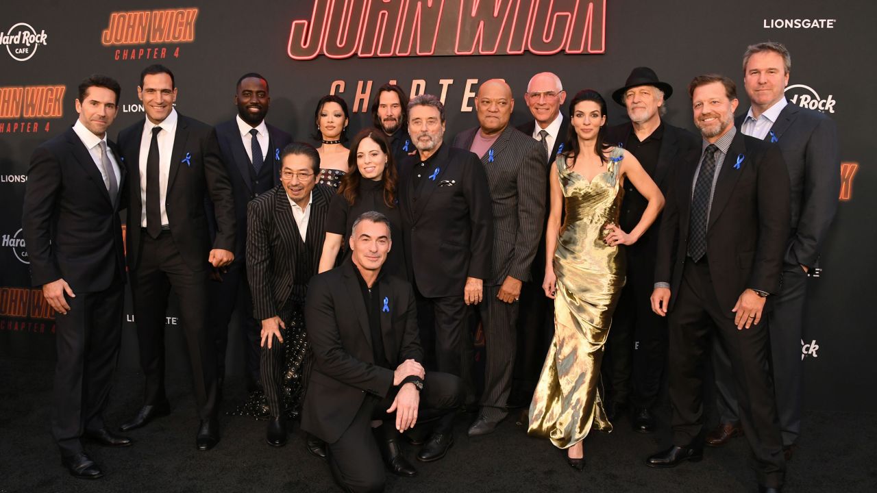The cast of 'John Wick: Chapter 4' wore blue ribbons to honor late actor Lance Reddick.