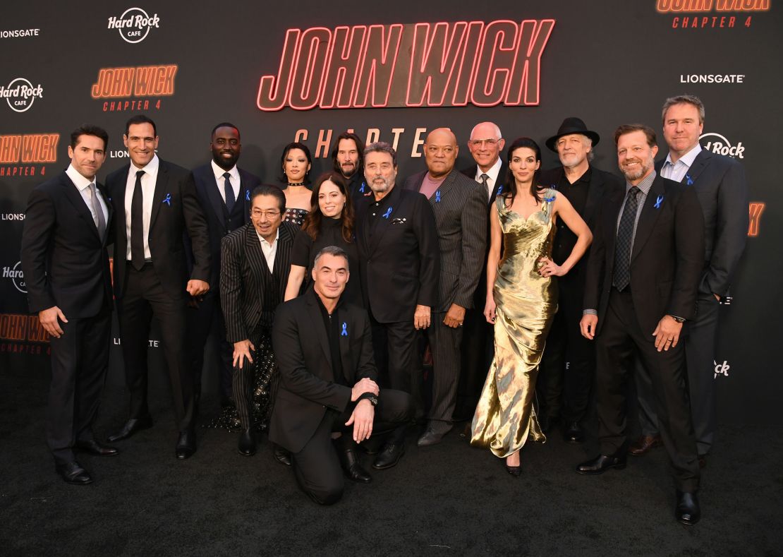 The cast of 'John Wick: Chapter 4' wore blue ribbons to honor late actor Lance Reddick.