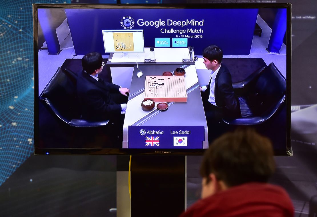 A man watches a television screen broadcasting live footage of the Google DeepMind Challenge Match at the Korea Baduk Association in Seoul in March 2016.