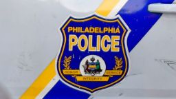 A Philadelphia Police seal is seen on the side of a police vehicle in 2020.  