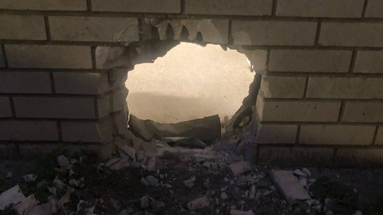 The hole made in a jail wall when the two inmates escaped, according to the Newport News Sheriff's Office.