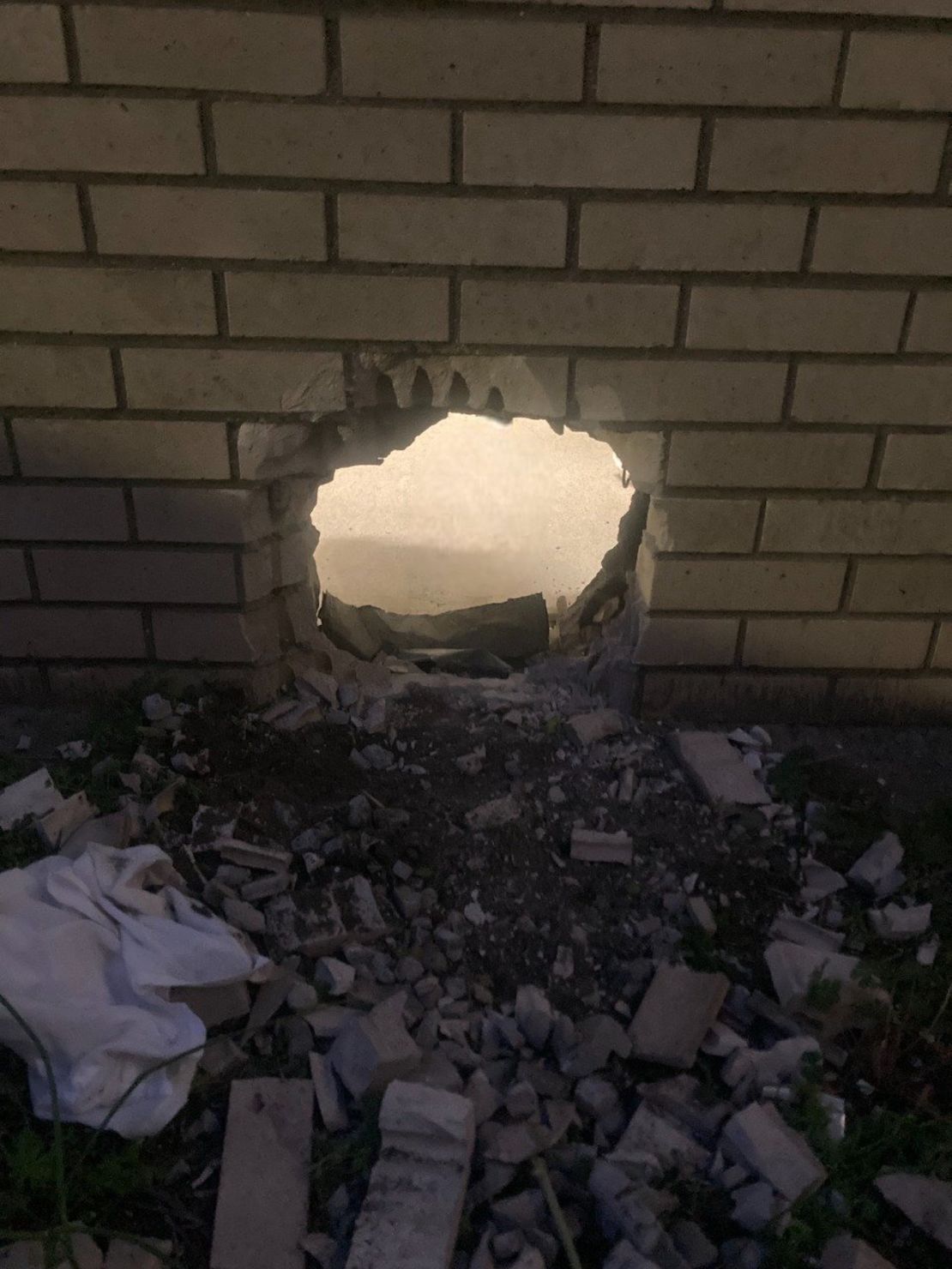 The hole made in a jail wall when the two inmates escaped, according to the Newport News Sheriff's Office.