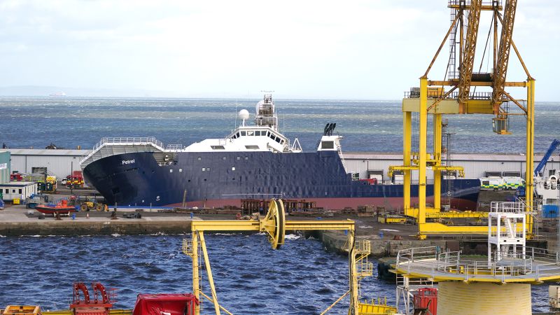 Large ship tips over at port in Edinburgh, causing injuries | CNN