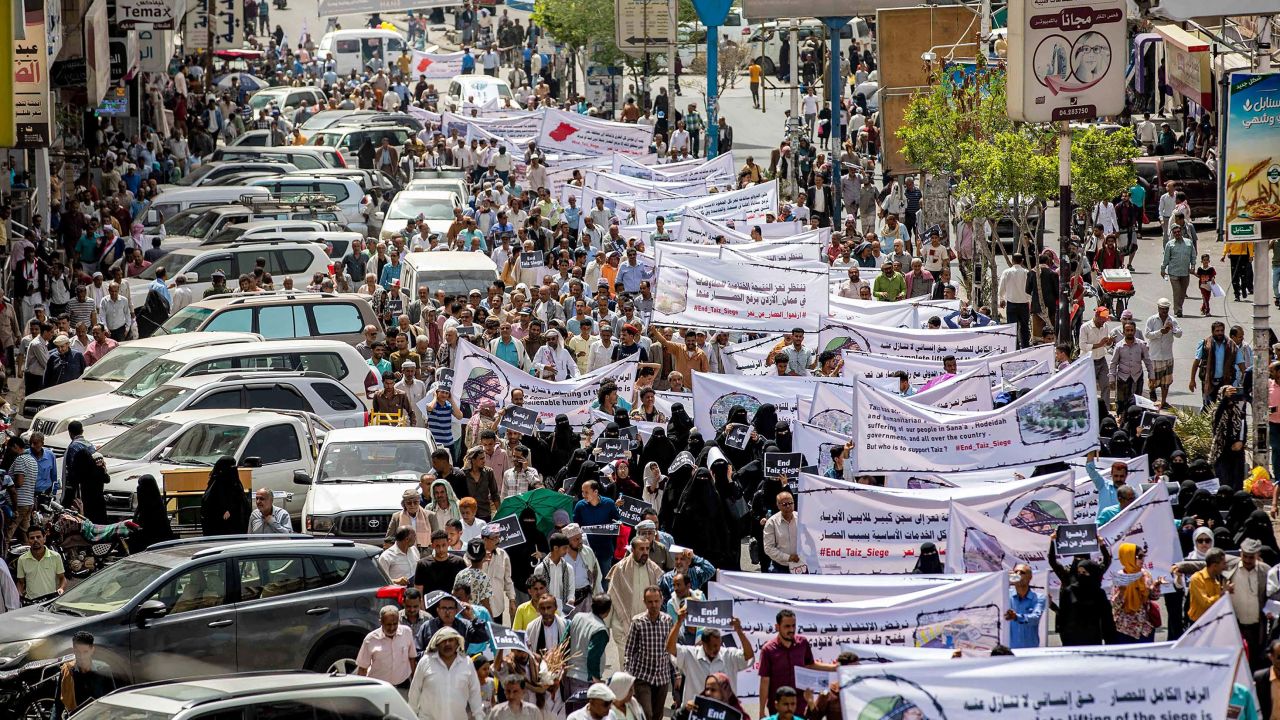 People gather for a demonstration demanding the end of a years-long siege imposed by Yemen's Houthi rebels in the city of Taiz, on May 25, 2022.