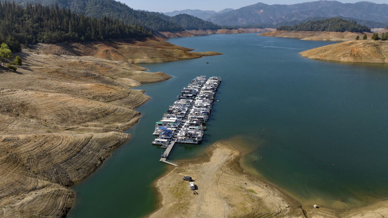 Boats are parked at the drought-ridden Shasta Lake in Lakehead, California on October 16, 2022.