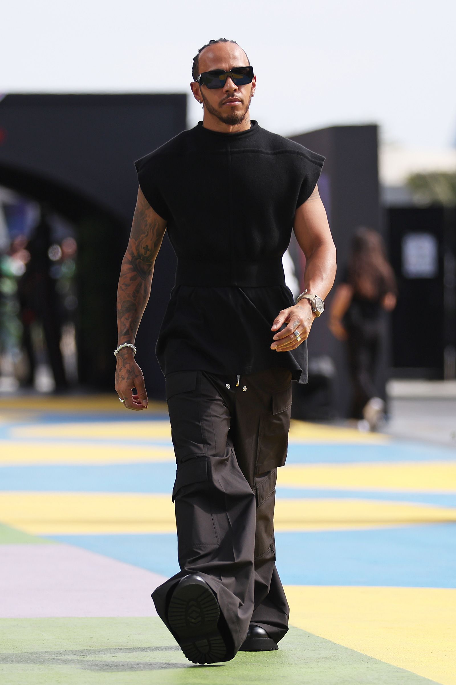 Lewis Hamilton brings the menswear runways to the racetrack | CNN