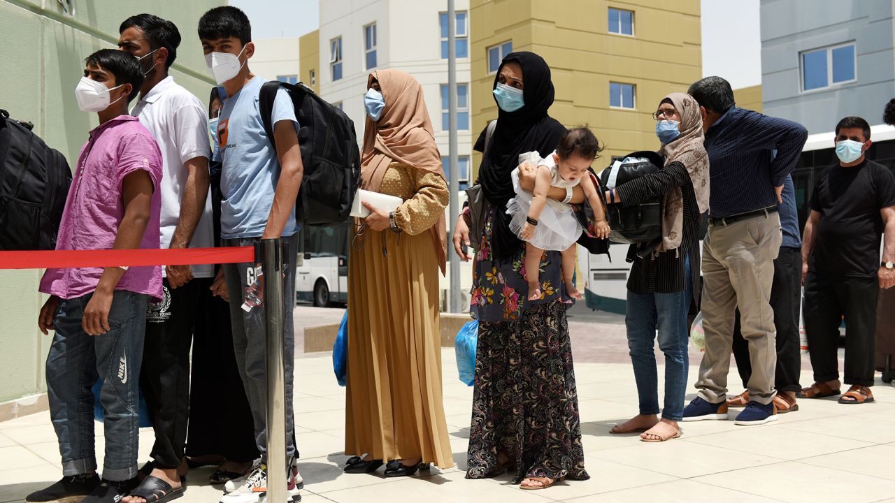 Evacuees from Afghanistan arrive at Emirates Humanitarian City in Abu Dhabi in August 2021.