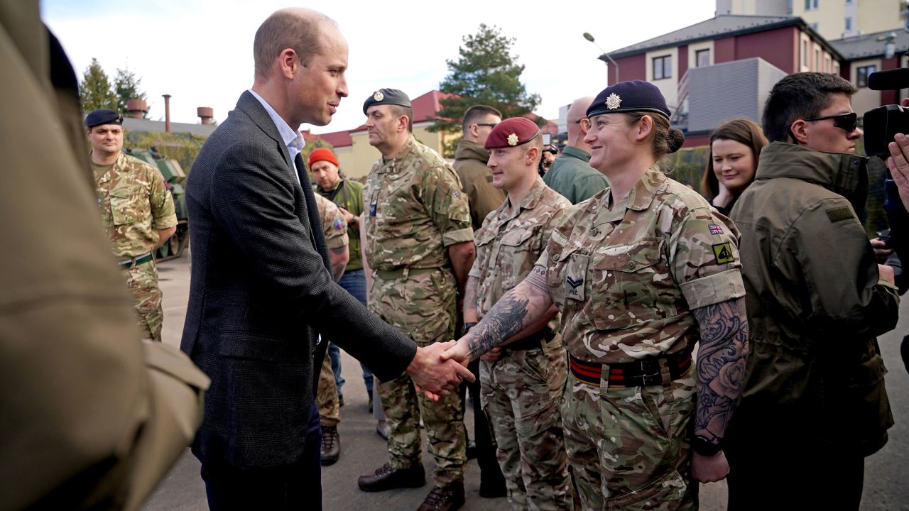 Prince William greeted members of the British military during the visit.