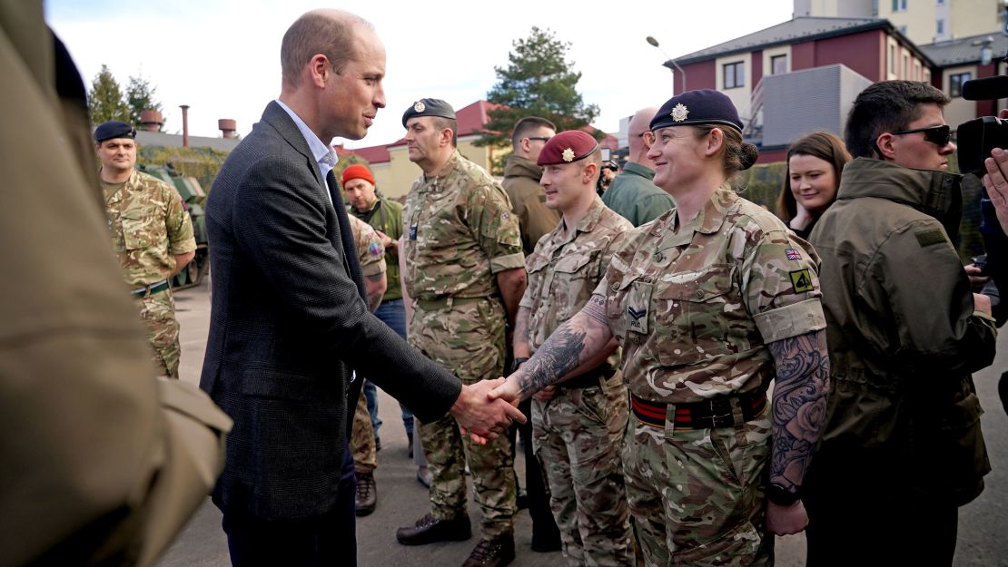 Prince William greeted members of the British military during the visit.
