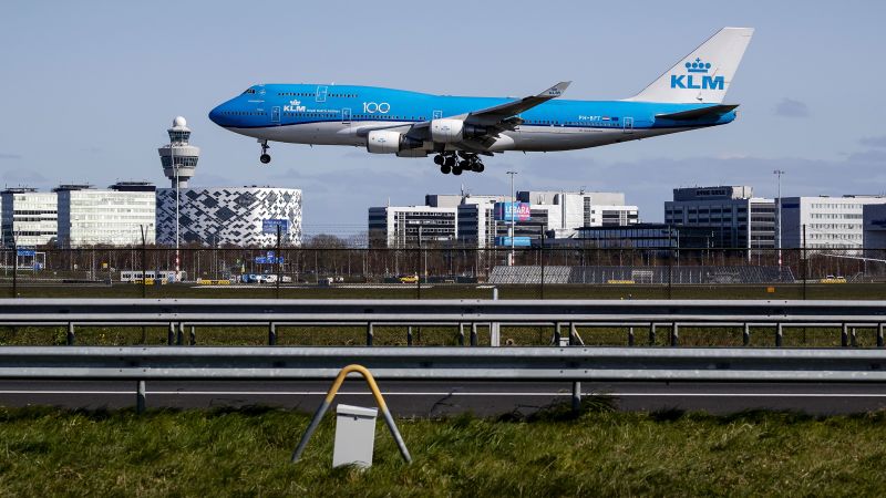 One of Europe’s busiest airports to be forced to cut flights due to planet-warming carbon pollution | CNN