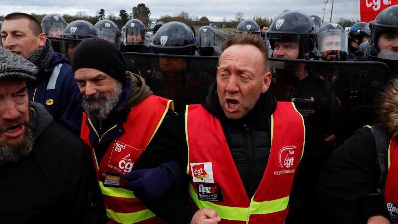 French airports, schools and oil refineries hit by national strike over pension age increase | CNN Business