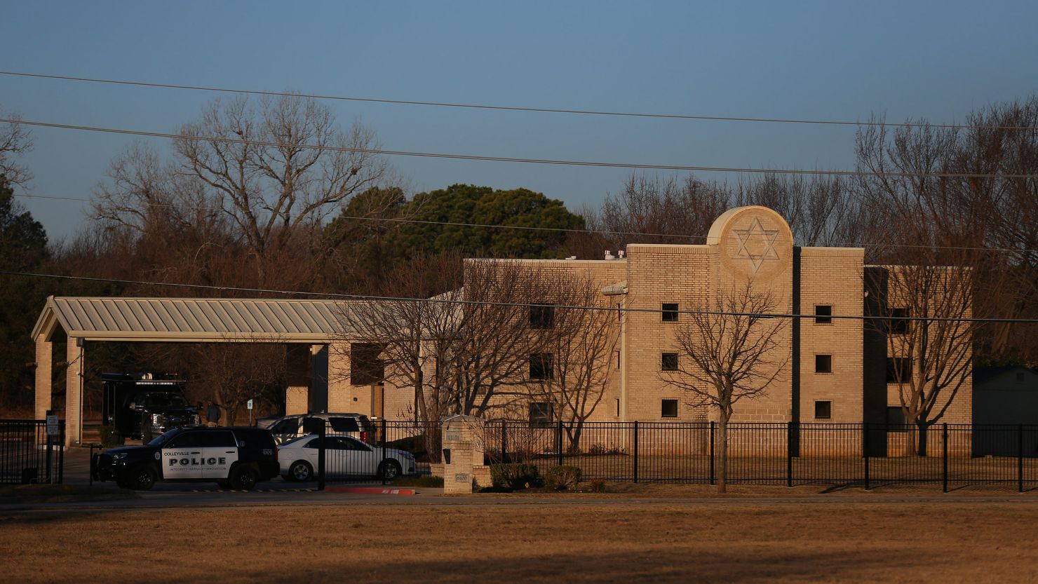 A Police car sits in front of the Congregation Beth Israel Synagogue in Colleyville, Texas, some 25 miles (40 kilometers) west of Dallas, on January 16, 2022. (Photo by ANDY JACOBSOHN/AFP via Getty Images)