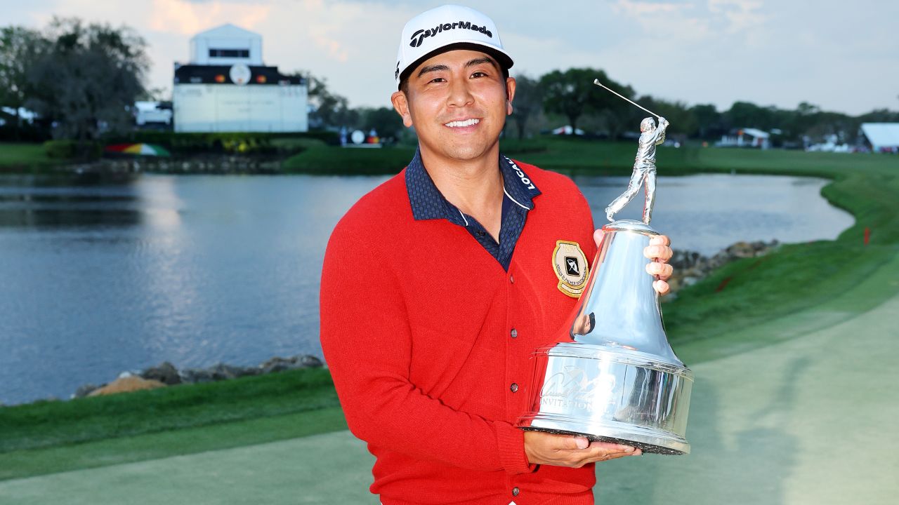 ORLANDO, FLORIDA - MARCH 05: Kurt Kitayama of the United States poses with the trophy after winning the Arnold Palmer Invitational presented by Mastercard at Arnold Palmer Bay Hill Golf Course on March 05, 2023 in Orlando, Florida. (Photo by Michael Reaves/Getty Images)