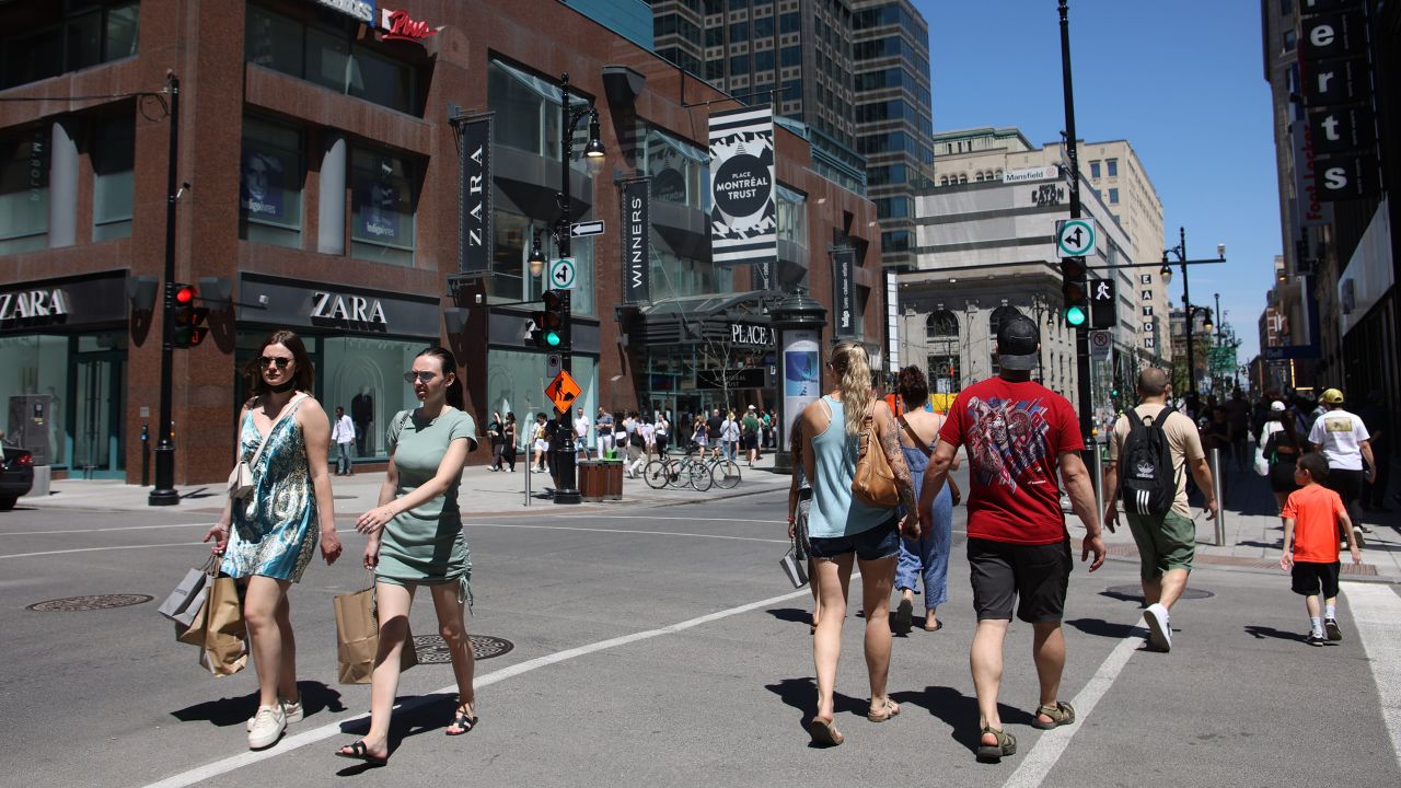 Pedestrians in the Canadian city of Montreal in May 2022. 