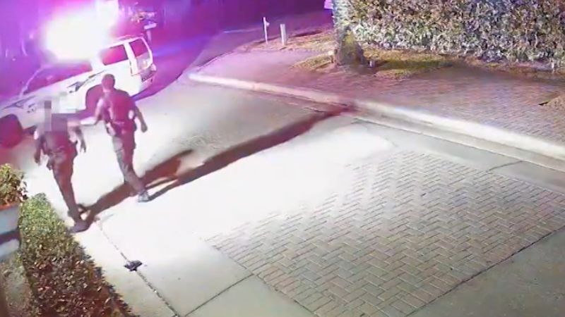 Video shows moment Sarasota, Florida police officer was hit by car in Bird Key neighborhood | CNN