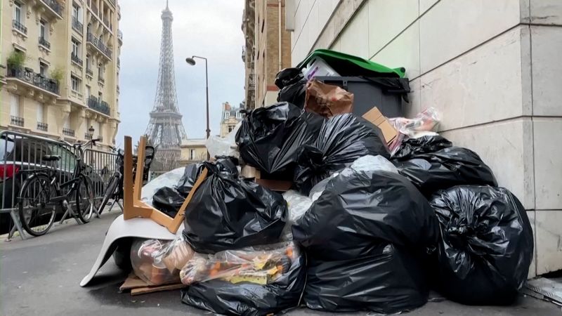 Trash is piling up on the streets of Paris. Here's why