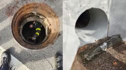 The New York City Fire Department shared these two images on Twitter showing a manhole and entrance into the sewer system.