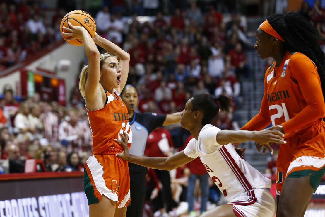 Haley Cavinder calls out to her team while being defended by Indiana Hoosiers guard Chloe Moore-McNeil. 