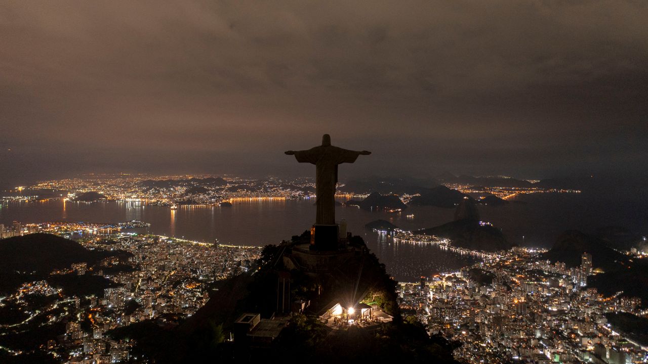 The statue of Christ the Redeemer is seen after being plunged into darkness for Earth Hour on March 26, 2022, in Rio de Janeiro, Brazil.