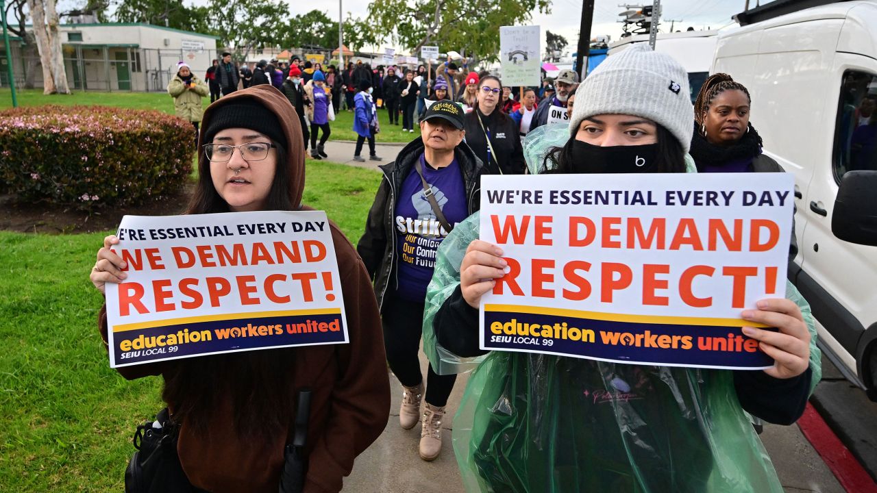 People protest for the third day as members of the Service Employees International Union Local 99 strike, in Los Angeles, California on March 23, 2023 - More than 500,000 children were shut out of lessons March 21 as school workers in Los Angeles began a three- day walkout over pay.  Bus drivers, cafeteria workers and special education assistants employed by Los Angeles Unified School District -- the second largest in the United States -- are striking over what they say are 