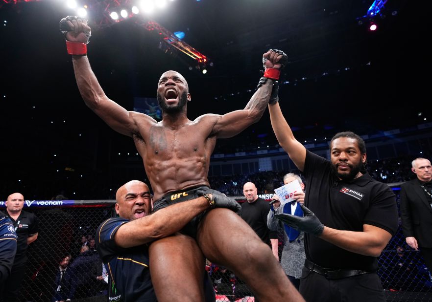 Leon Edwards celebrates after he defeated Kamaru Usman to defend his UFC welterweight title on Saturday, March 18. Edwards won by majority decision.