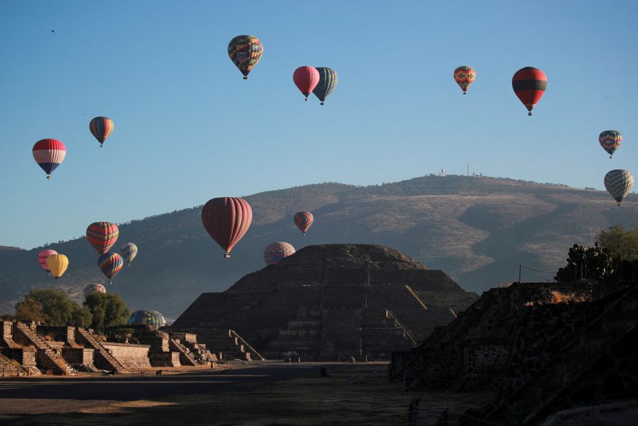 Hot-air balloons float above the Pyramid of the Moon in Teotihuacán, Mexico, on Monday, March 20.