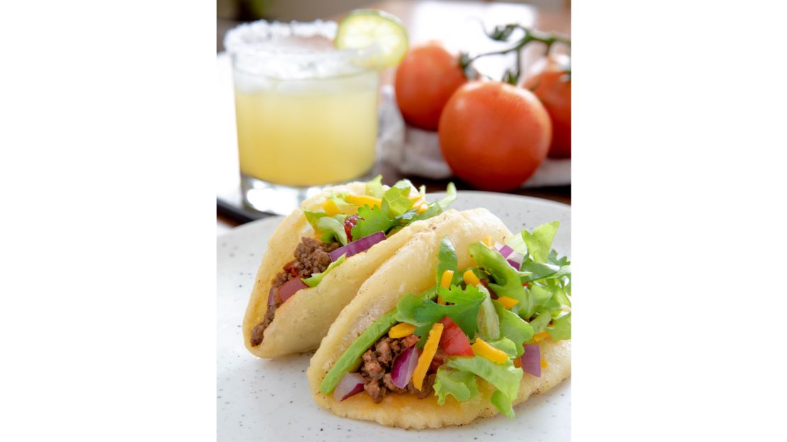 Puffy tacos are just one of many reasons to pay a visit to San Antonio, Ralat says.