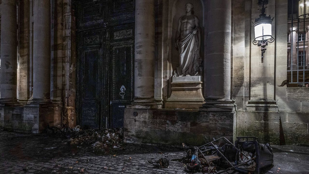 The gate of the Bordeaux city hall after it was set on fire during a demonstration on a national day of action, on March 23 in Bordeaux, southwestern France.