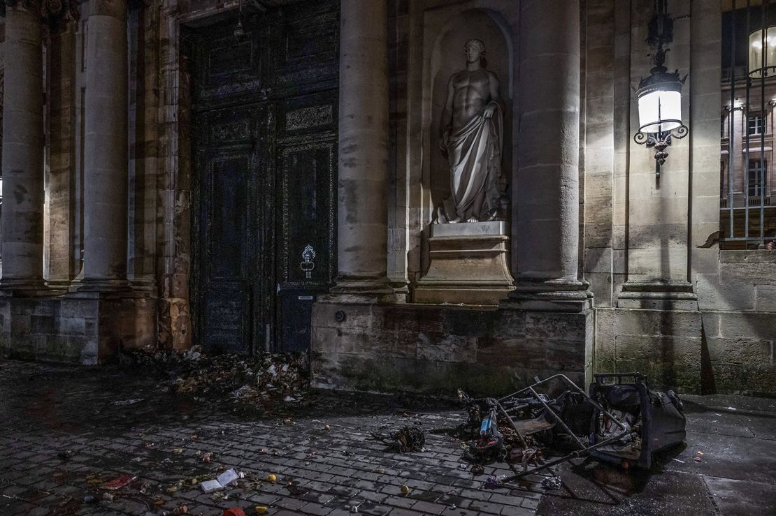 The gate of the Bordeaux city hall after it was set on fire during a demonstration on a national day of action, on March 23 in Bordeaux, southwestern France.