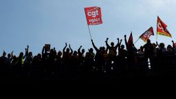 Protesters, holding CGT labour union flags, attend a demonstration during the ninth day of nationwide strikes and protests against French government's pension reform, in Nice, France, March 23, 2023.      