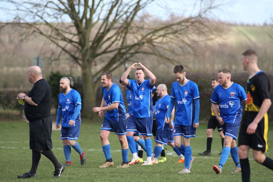 Players from Sands United FC South Yorkshire celebrate a goal.