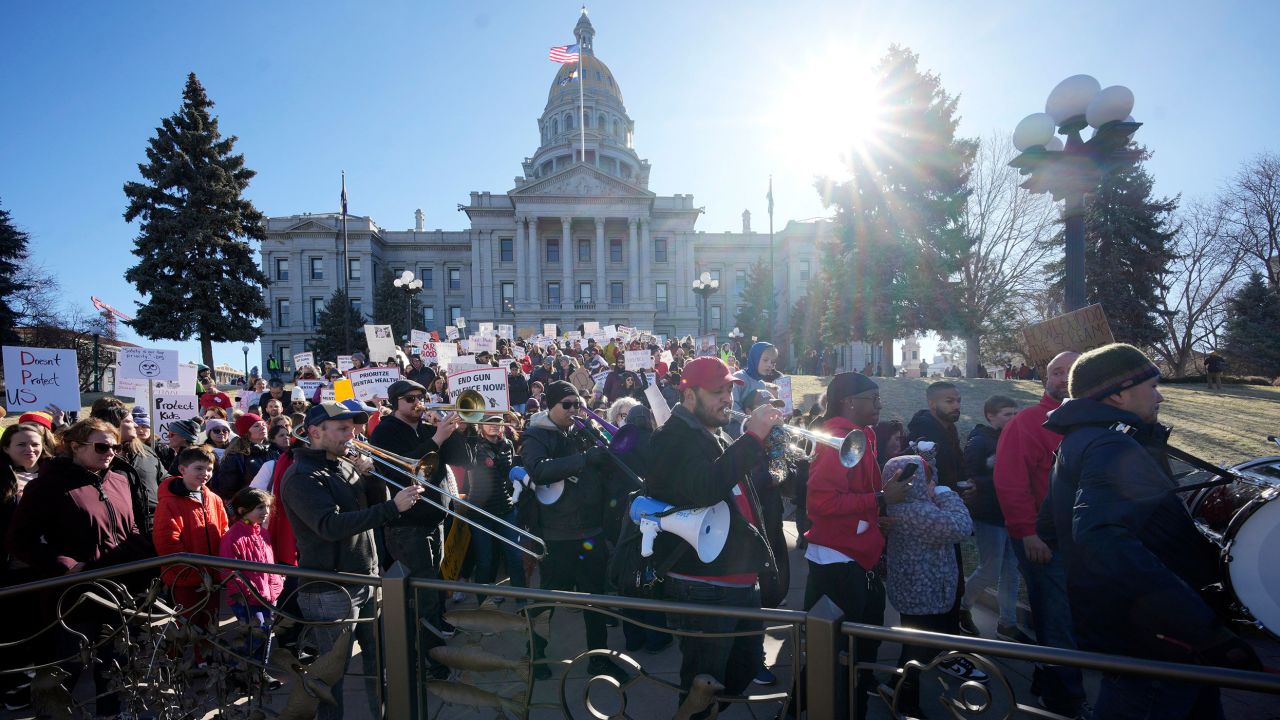 Students and parents from schools across Colorado rally, Friday, March 24, 2023, outside the State Capitol in Denver, calling for lawmakers to pass gun control measures.