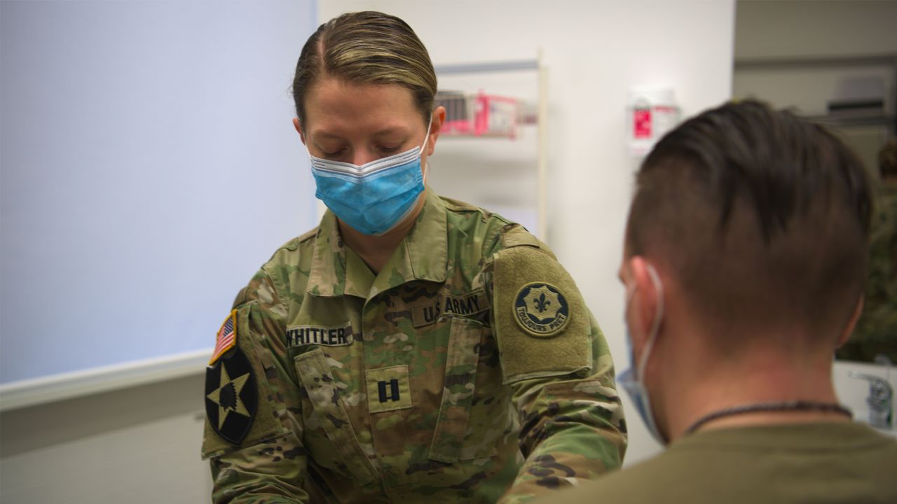 US Army Captain Christina Whitler, a physician assistant assigned to the Field Artillery Squadron, 2d Cavalry Regiment, treats a patient during clinic hours at the Vilseck Medical Treatment Facility, located at Rose Barracks, Germany, March 9, 2023. 