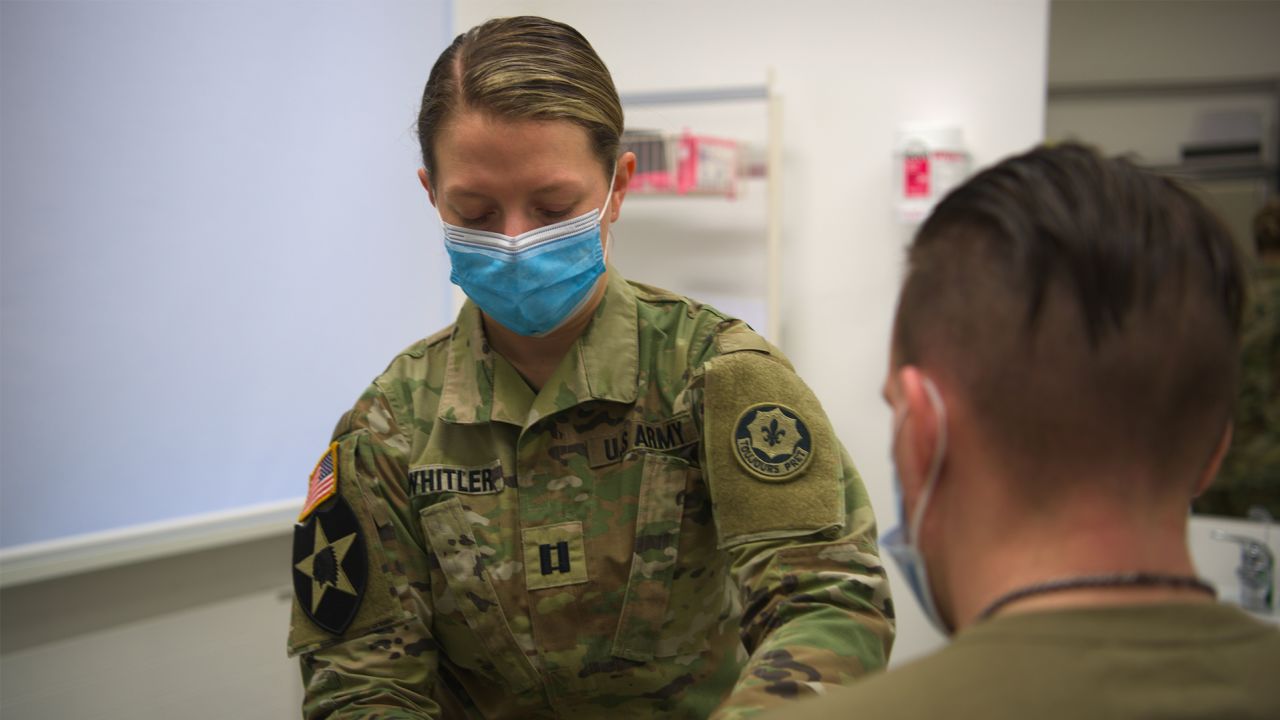 US Army Captain Christina Whitler, a physician assistant assigned to the Field Artillery Squadron, 2d Cavalry Regiment, treats a patient during clinic hours at the Vilseck Medical Treatment Facility, located at Rose Barracks, Germany, March 9, 2023.