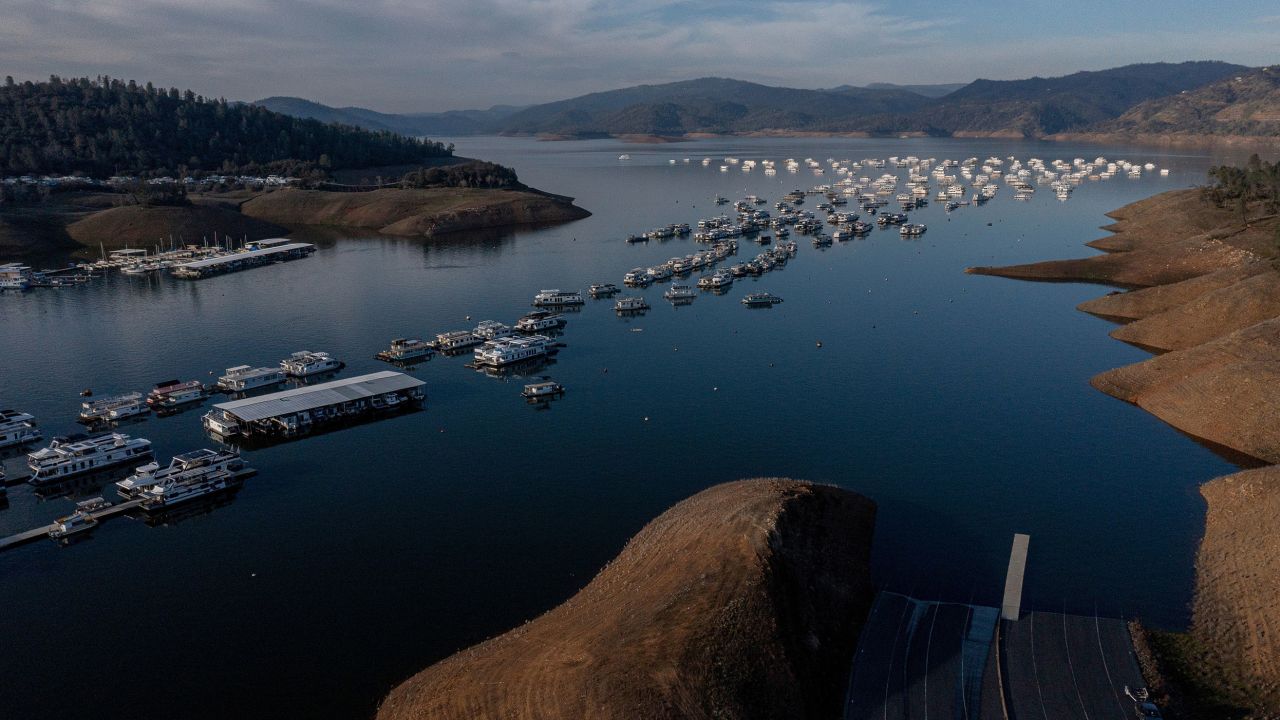 Houseboats on Lake Oroville in Oroville, California, US, on Feb. 20, 2023. California will be able to increase the amount of water it delivers to 27 million residents after a series of recent storms that brought record rains and helped replenish drought-parched reservoirs.