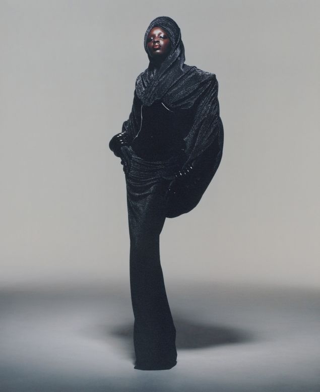 "Break My Soul" is a hooded, draped dress with a 3D-printed black chrome-plated bustier.