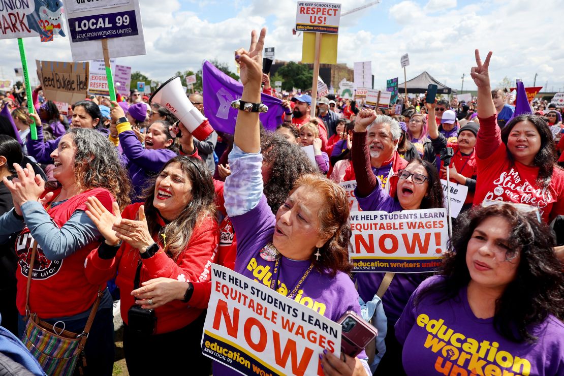 People rally Thursday in support of a school workers' strike in Los Angeles.