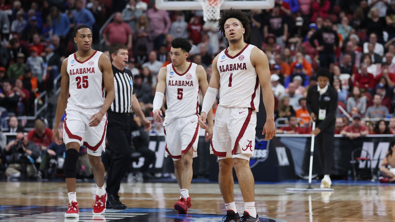 Nimari Burnett #25 of the Alabama Crimson Tide, Jahvon Quinerly #5 and Mark Sears #1 react after losing to the San Diego State Aztecs, 71-64, on March 24, 2023 in Louisville, Kentucky. 