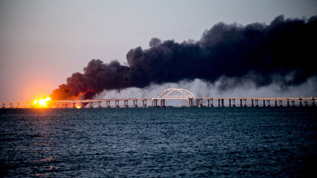 An explosion causes a fire on the bridge across the Kerch Strait linking Russia to occupied Crimea, on October 08, 2022.