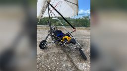 Two Cuban migrants flew into Key West International Airport in Florida on Saturday on a motorized hang glider, local police say. 