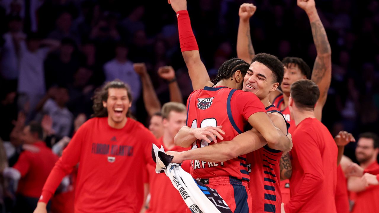 Jalen Gaffney #12 and Bryan Greenlee #4 of the Florida Atlantic Owls celebrate after defeating the Kansas State Wildcats in the Elite Eight round game of the NCAA Men's Basketball Tournament at Madison Square Garden.