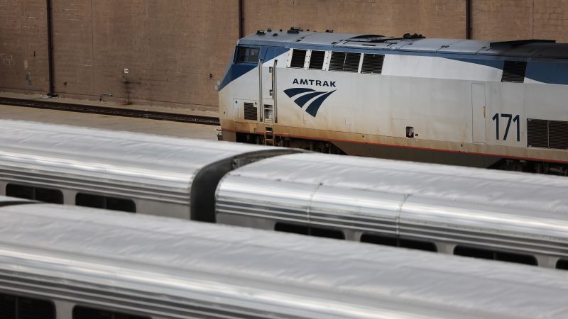Read more about the article Amtrak begins to restore service after server issues force cancellations – CNN