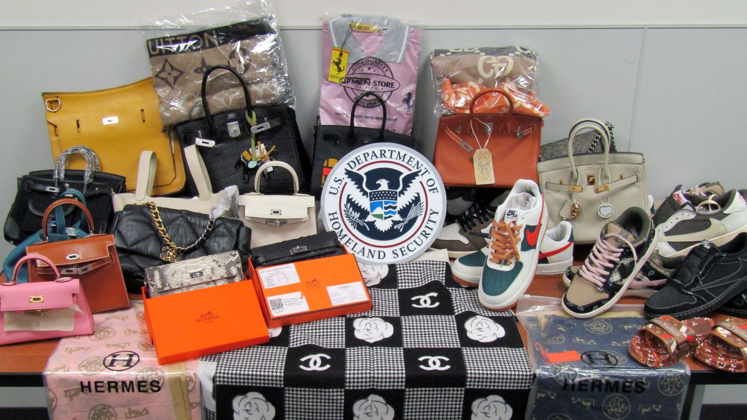 Customs officers in Norfolk, Virginia, displayed some of the fake designer goods they seized.